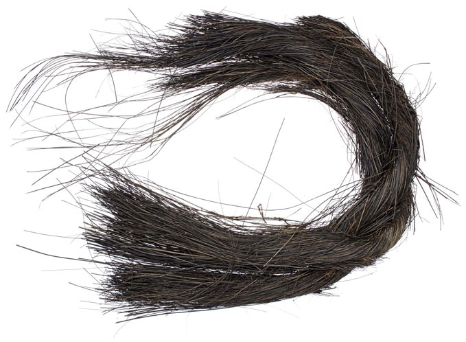 Monumenten en Archeologie, gemeente Amsterdam, Harold Strak & Willem van Zoetendaal, balein van walvis. Balein werd gebruikt als spaak in een paraplu of parasol, of in korsetten en hoepelrokken. Datering: 1300-1700. Afmetingen: 370x240 mm. Locatie: Nieuwebrug, Damrak.