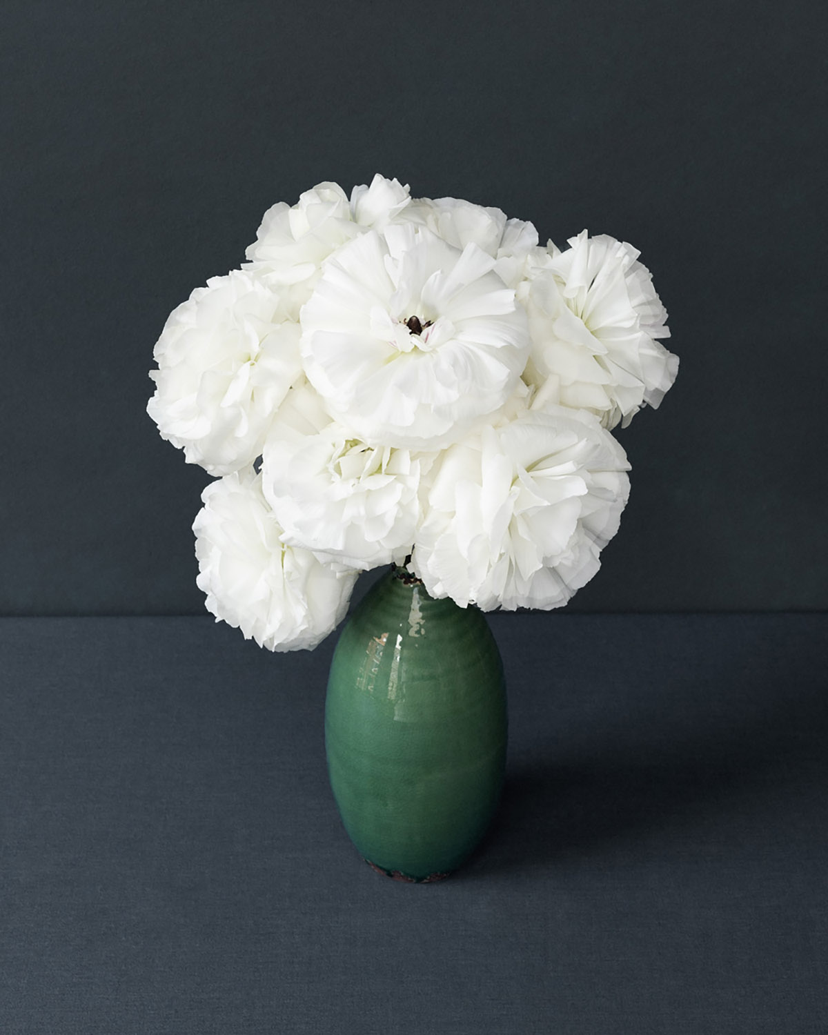 Puck Soetens, Ranonculus in a green vase