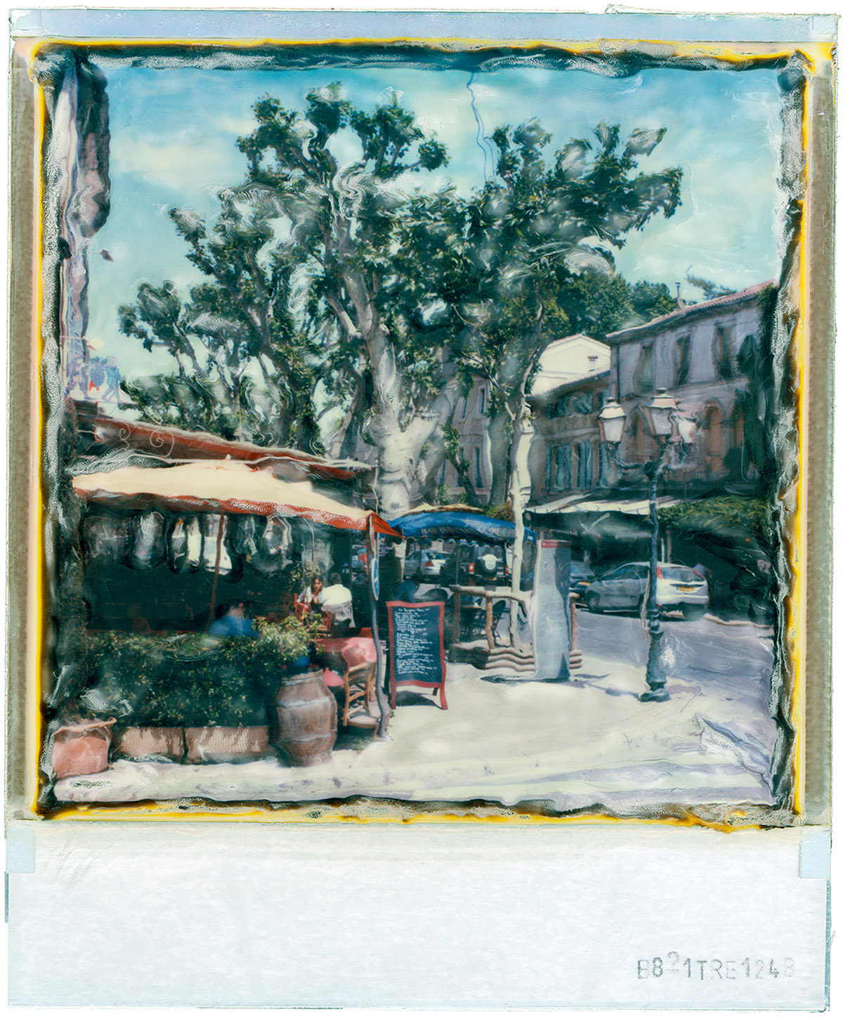 Pim Westerweel, Café Decouvert st.Remy (Fr.) - 2004, Manipulated Polaroid SX-70, C-print op 60x50 cm, Glanzend Fujicolor Crystal Archive Paper, in 70x50 cm passe-partout en aluminium lijst, Ed. 1/10, 450 euro