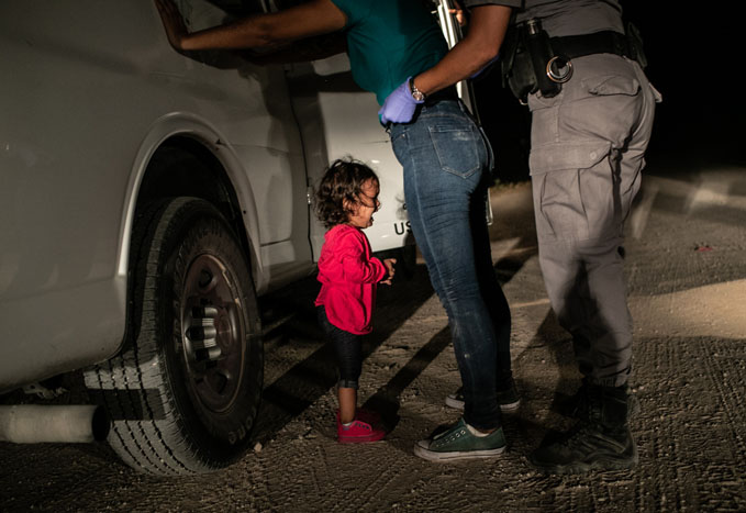 John Moore, Honduran toddler Yanela Sanchez cries as she and her mother, Sandra Sanchez, are taken into custody by US border officials in McAllen, Texas, USA, on 12 June.