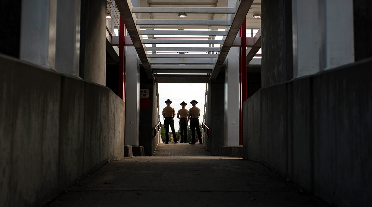 Dana Beesley, MVA Photographer of the Year, Drill instructors with Echo Company, 2nd Recruit Training Battalion, take a brief respite in between drill evaluations at the Peatross Parade Deck on Marine Corps Recruit Depot Parris Island, S.C. June 10, 2020. The drill instructors are individually evaluated without a recruit platoon on their overall appearance, knowledge and bearing.