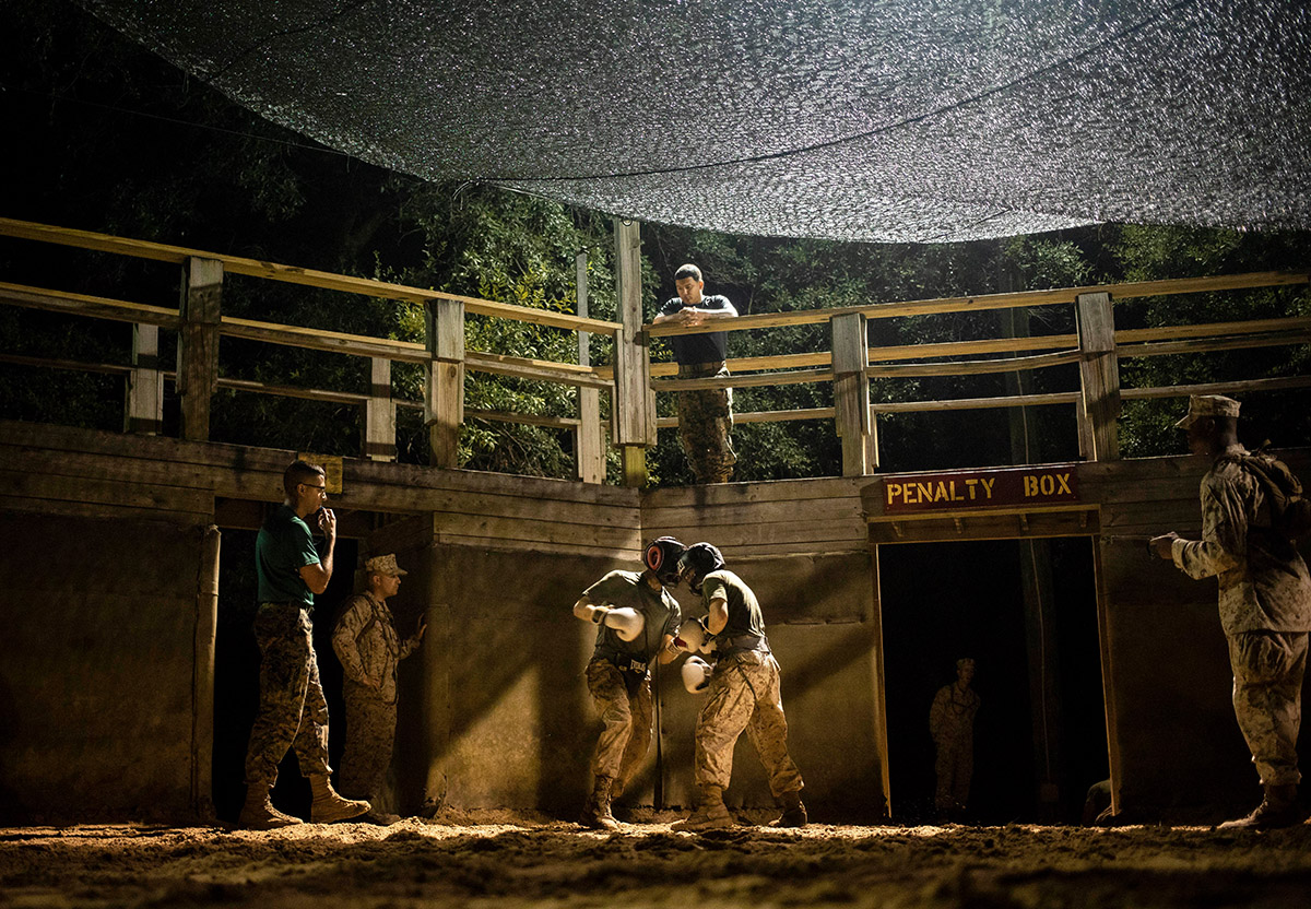 Dana Beesley, MVA Photographer of the Year, Picture Story Caption: Drill Instructors and staff with Mike Company, 3rd Recruit Training Battalion, watch and observe as their recruits battle each other during Crucible boxing bouts on Marine Corps Recruit Depot Parris Island, S.C. Oct. 8, 2020. The Crucible is the final test of physical and mental endurance recruits will face before earning the title United States Marine, and is a culmination of all of the skills learned throughout recruit training.