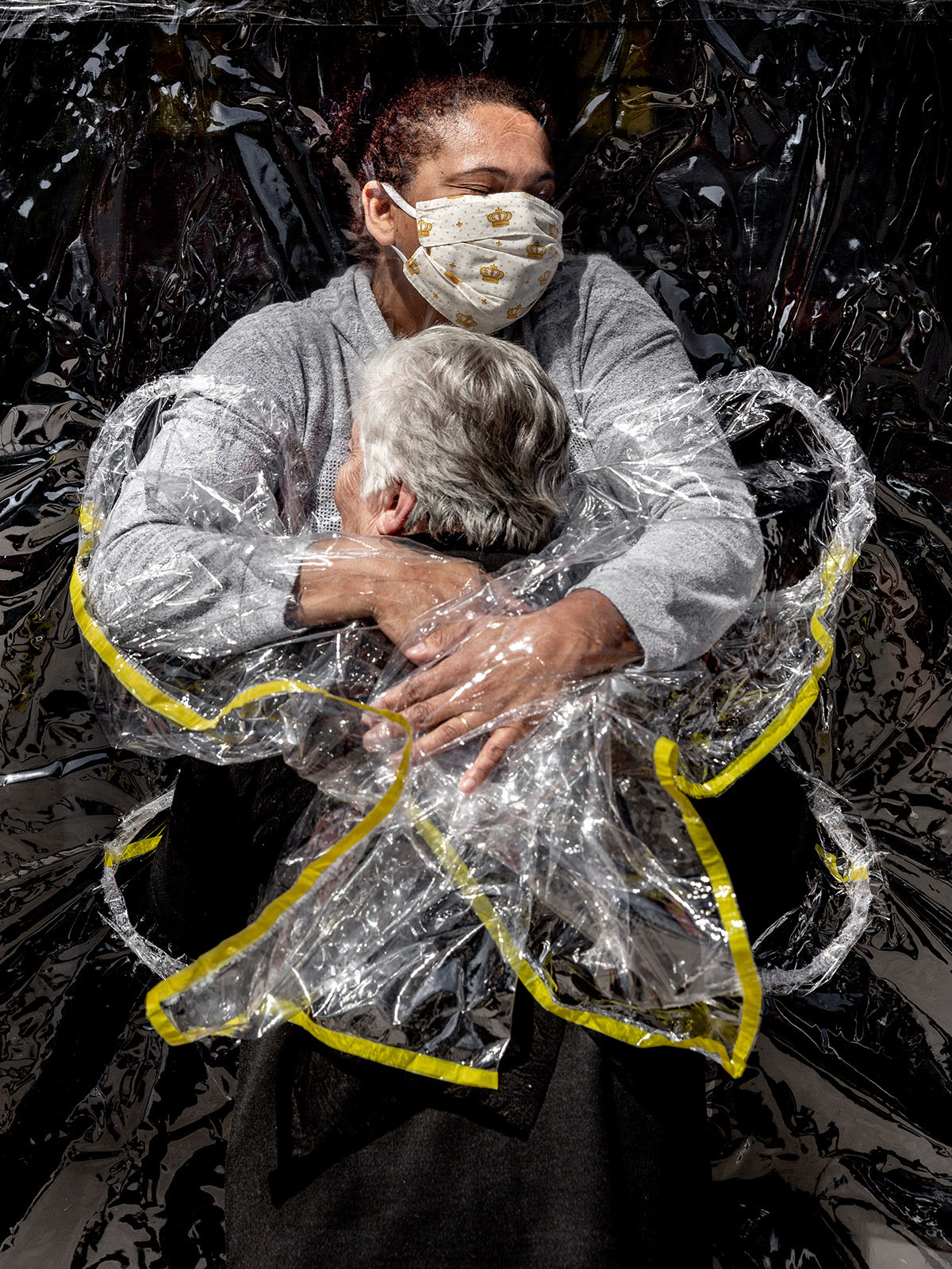 World Press Photo of the Year Nominee, Mads Nissen, Denmark, Politiken/Panos Pictures, The First Embrace. Rosa Luzia Lunardi (85) is embraced by nurse Adriana Silva da Costa Souza, at Viva Bem care home, São Paulo, Brazil, on 5 August.